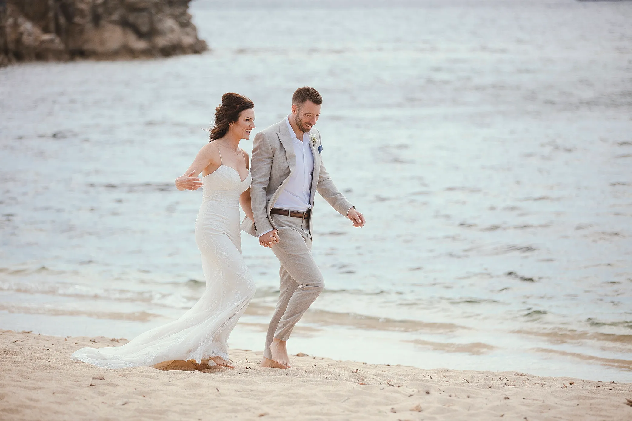 Sunlit candid wedding photography at a Mykonos villa, in Mykonos, Greece
