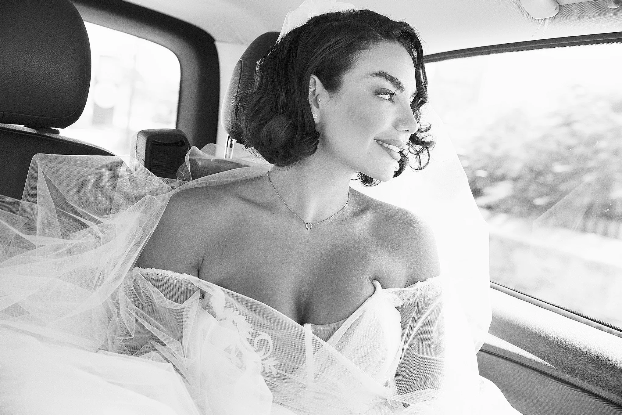 Sunlit candid wedding photography in a Mykonos courtyard, in Mykonos, Greece