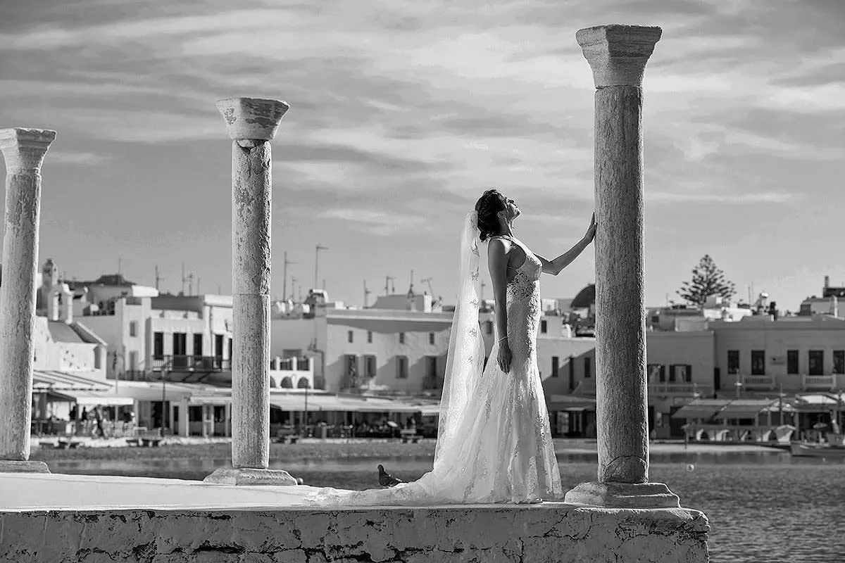 Sunlit altar ceremony wedding photography on a Cycladic terrace, in Mykonos, Greece
