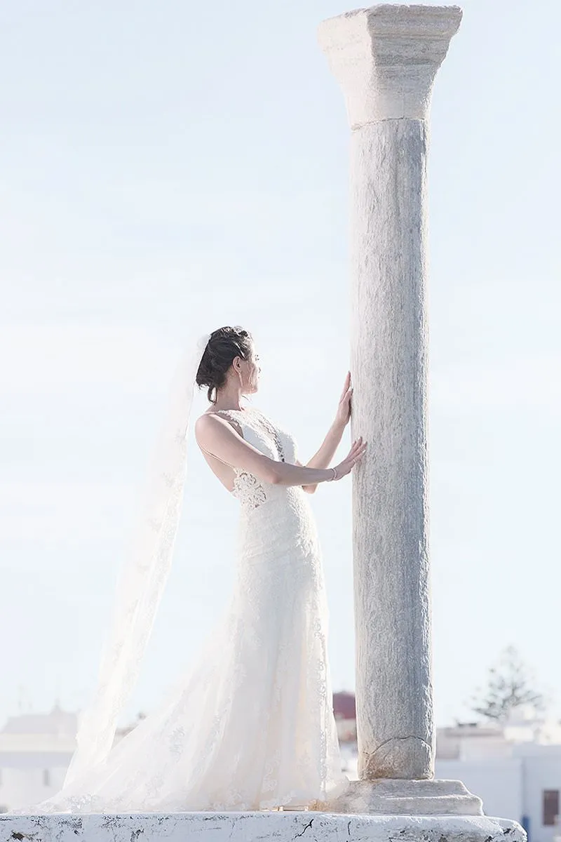 Sunlit altar ceremony wedding photography at a whitewashed chapel, in Mykonos, Greece