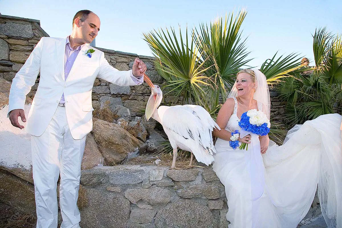Sunlit ceremony wedding photography on a sandy beach, in Mykonos, Greece