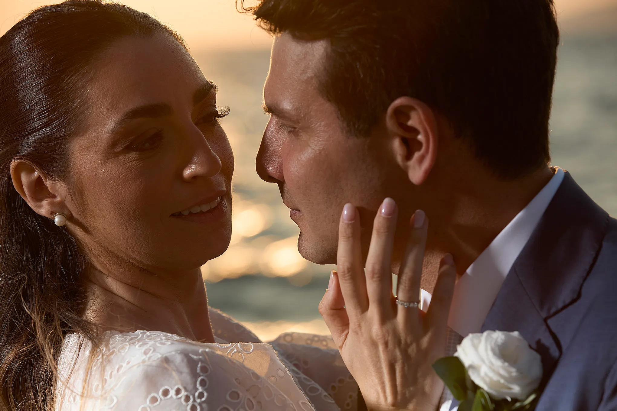 Sunlit documentary wedding photography at a whitewashed chapel, in Mykonos, Greece