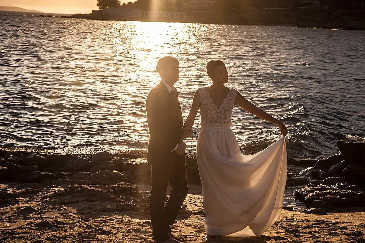 Sunlit editorial couple wedding photography at a Mykonos villa, in Mykonos, Greece