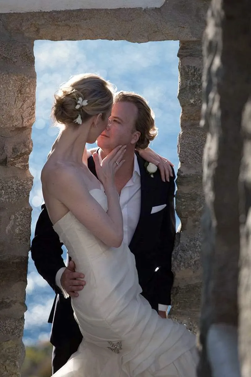 Sunlit floral wedding photography in a Mykonos courtyard, in Mykonos, Greece