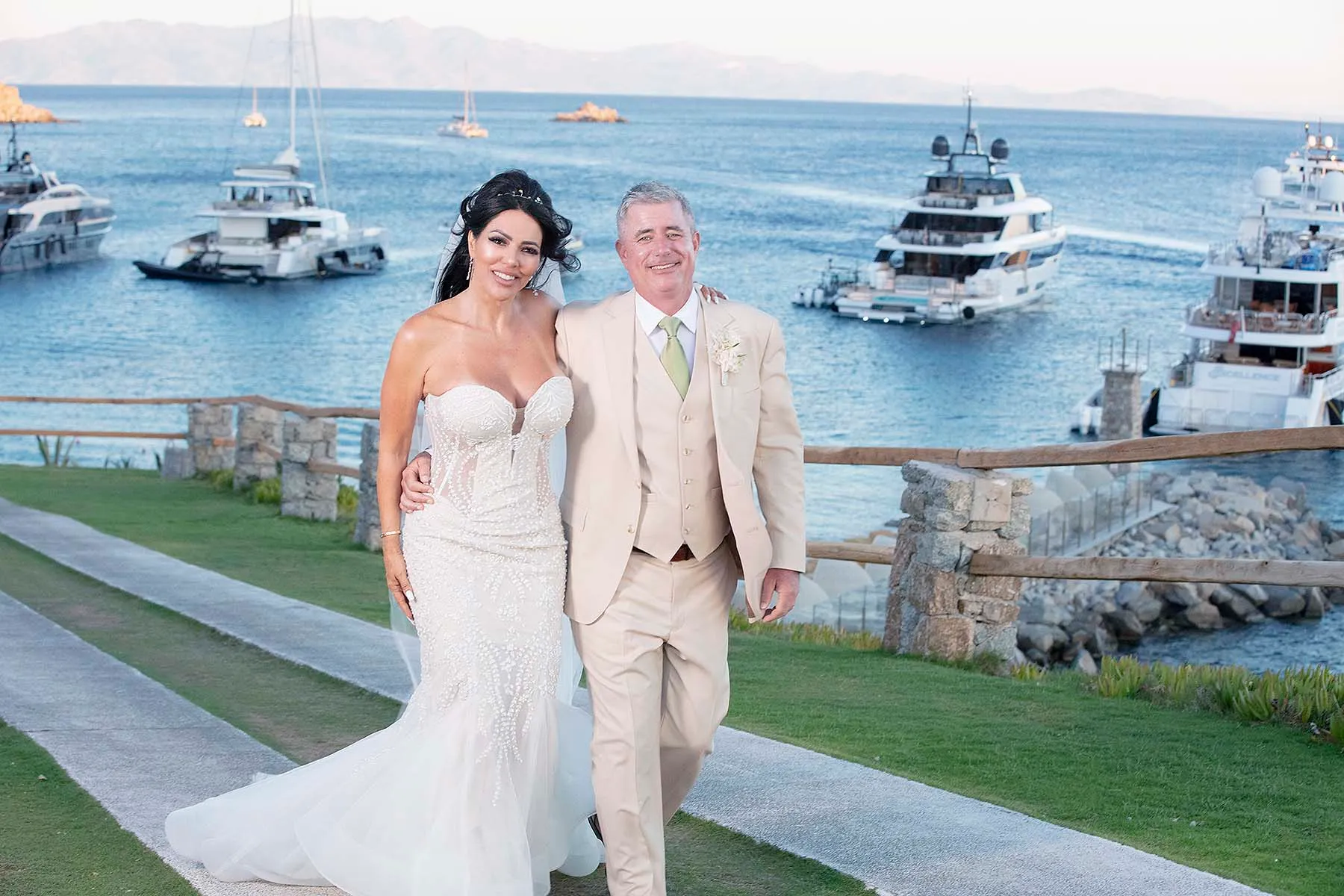 Sunlit golden hour wedding photography on a Cycladic terrace, in Mykonos, Greece