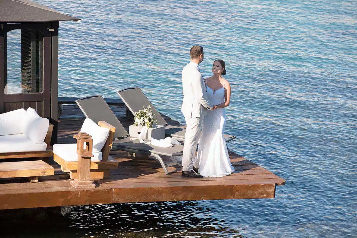 Sunlit intimate wedding photography at a Mykonos villa, in Mykonos, Greece