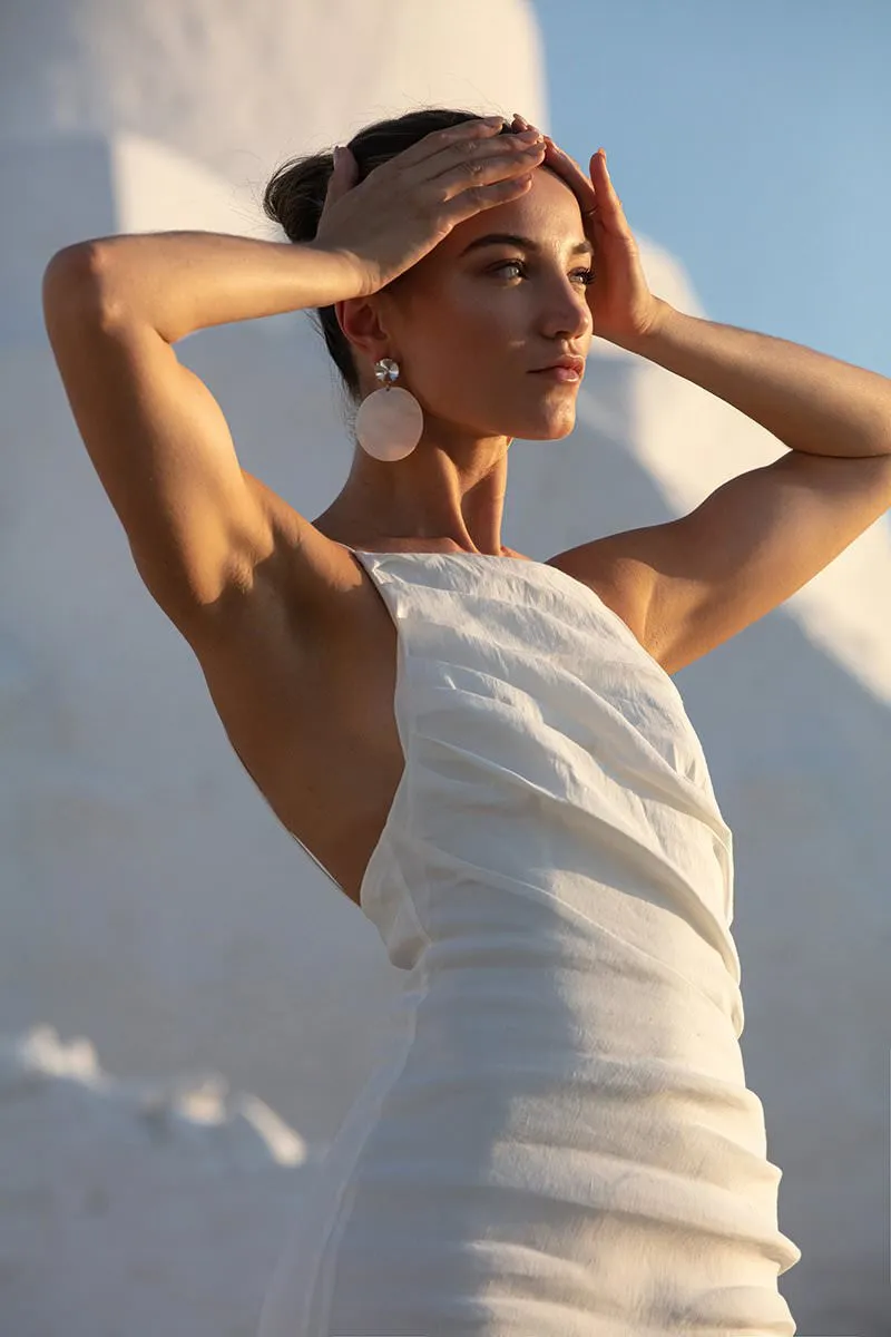 Sunlit intimate wedding photography in a Mykonos courtyard, in Mykonos, Greece