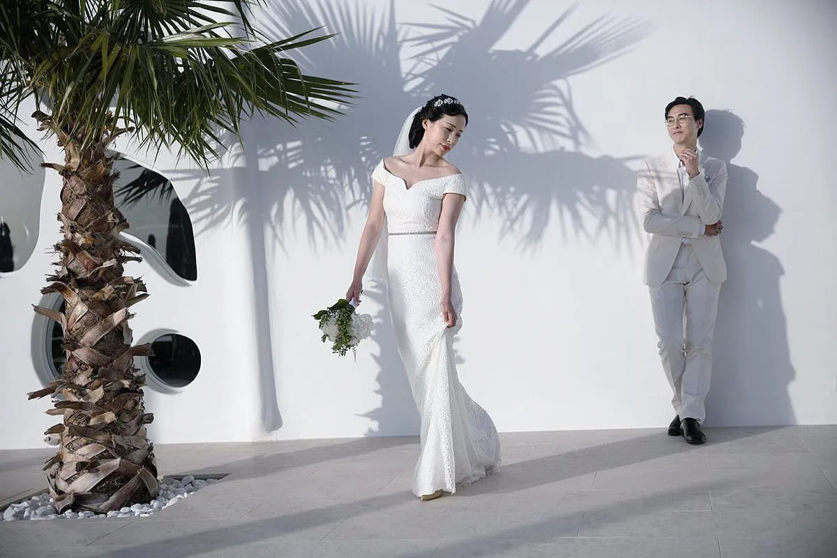 Sunlit monochrome wedding photography at a Mykonos villa, in Mykonos, Greece
