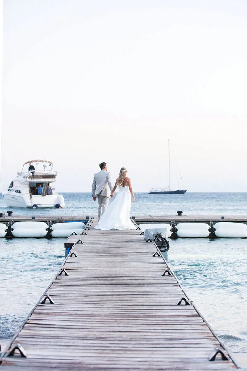 Sunlit monochrome wedding photography in a Mykonos courtyard, in Mykonos, Greece