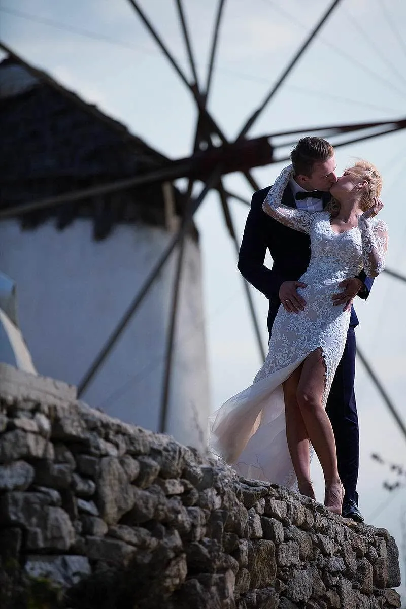 Sunlit reception wedding photography at a whitewashed chapel, in Mykonos, Greece