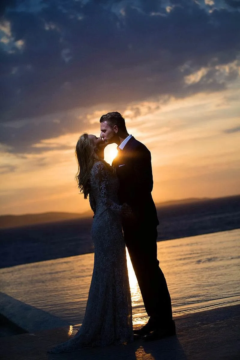 Sunlit reception wedding photography on a sandy beach, in Mykonos, Greece