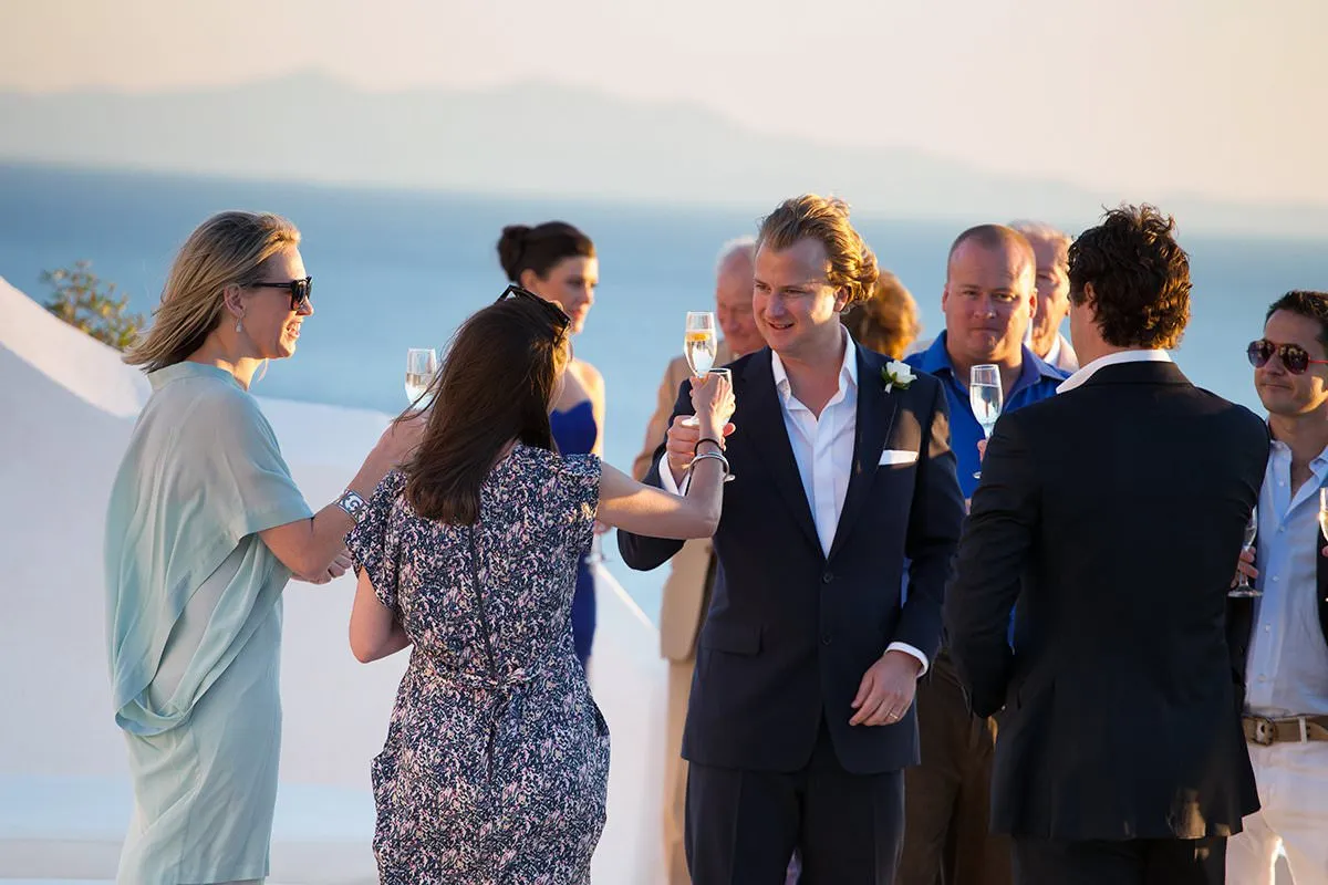 Sunlit rooftop wedding photography by the Aegean sea, in Mykonos, Greece