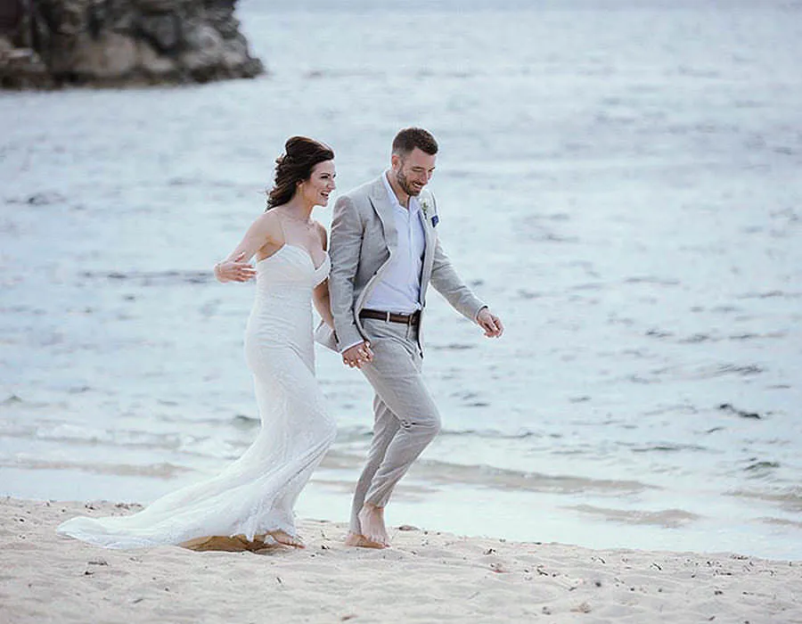 Sunlit vows wedding photography on a Cycladic terrace, in Mykonos, Greece