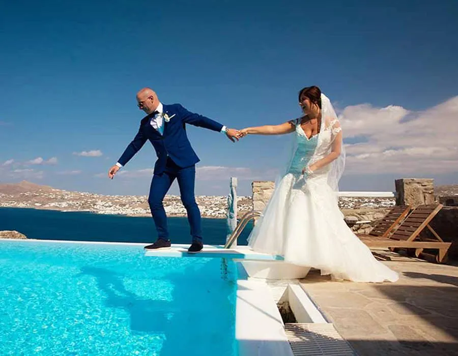 Sunlit vows wedding photography in a Mykonos courtyard, in Mykonos, Greece