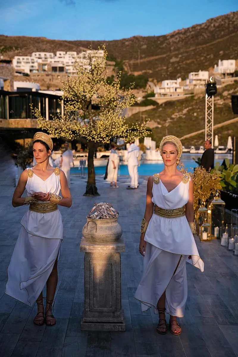 Sunlit white decor wedding photography at a whitewashed chapel, in Mykonos, Greece